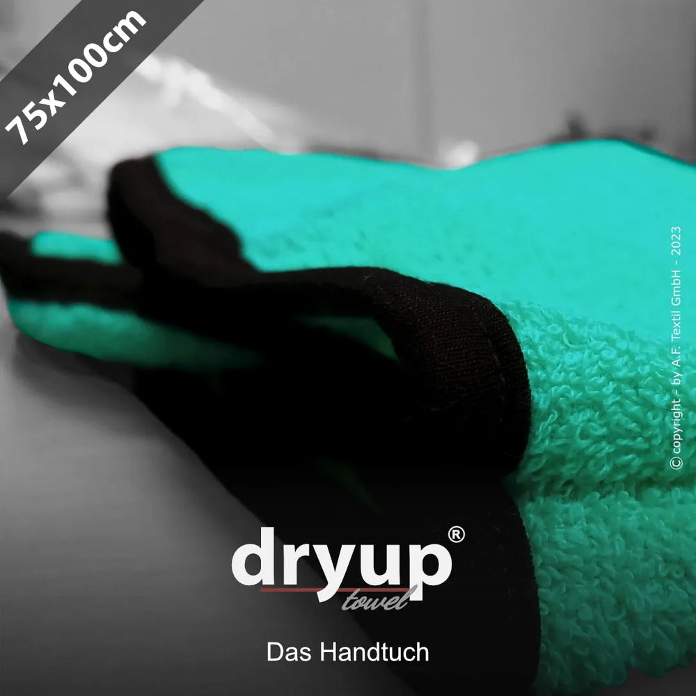 "Türkises Dryup® Handtuch mit schwarzen Rändern, 75 x 100 cm, auf glatter Oberfläche präsentiert."